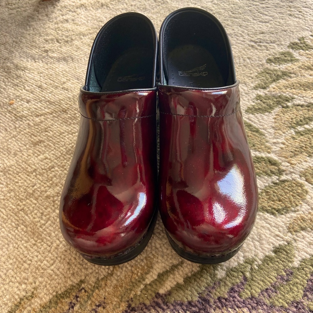 Dansko Clogs Size 38 (US size 7.5-8). Dark Red Patent Leather. Never worn.